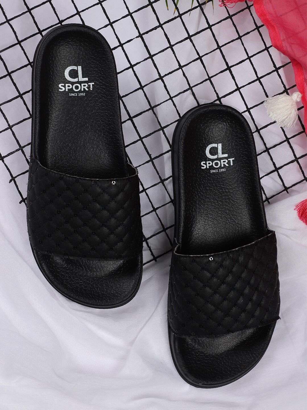 Carlton London sports Women Black Quilted Textured Sliders Price in India