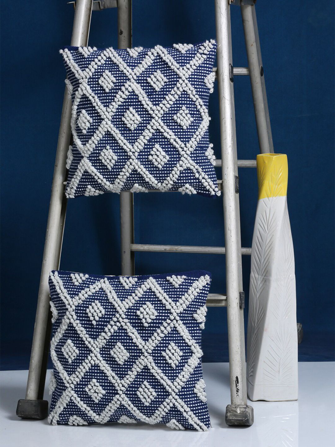 HOSTA HOMES Pack Of 2 Blue & White Geometric Self Designed Square Cushion Covers Price in India