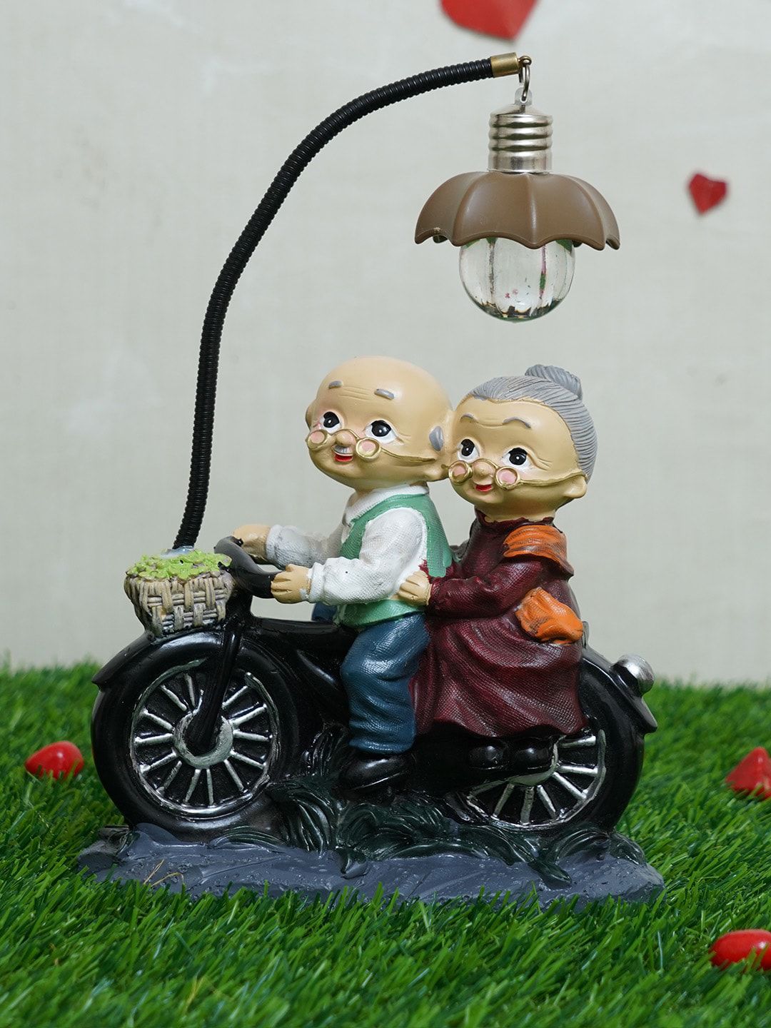 TIED RIBBONS Black & Beige Old Age Love Couple With Led Light Showpiece Price in India