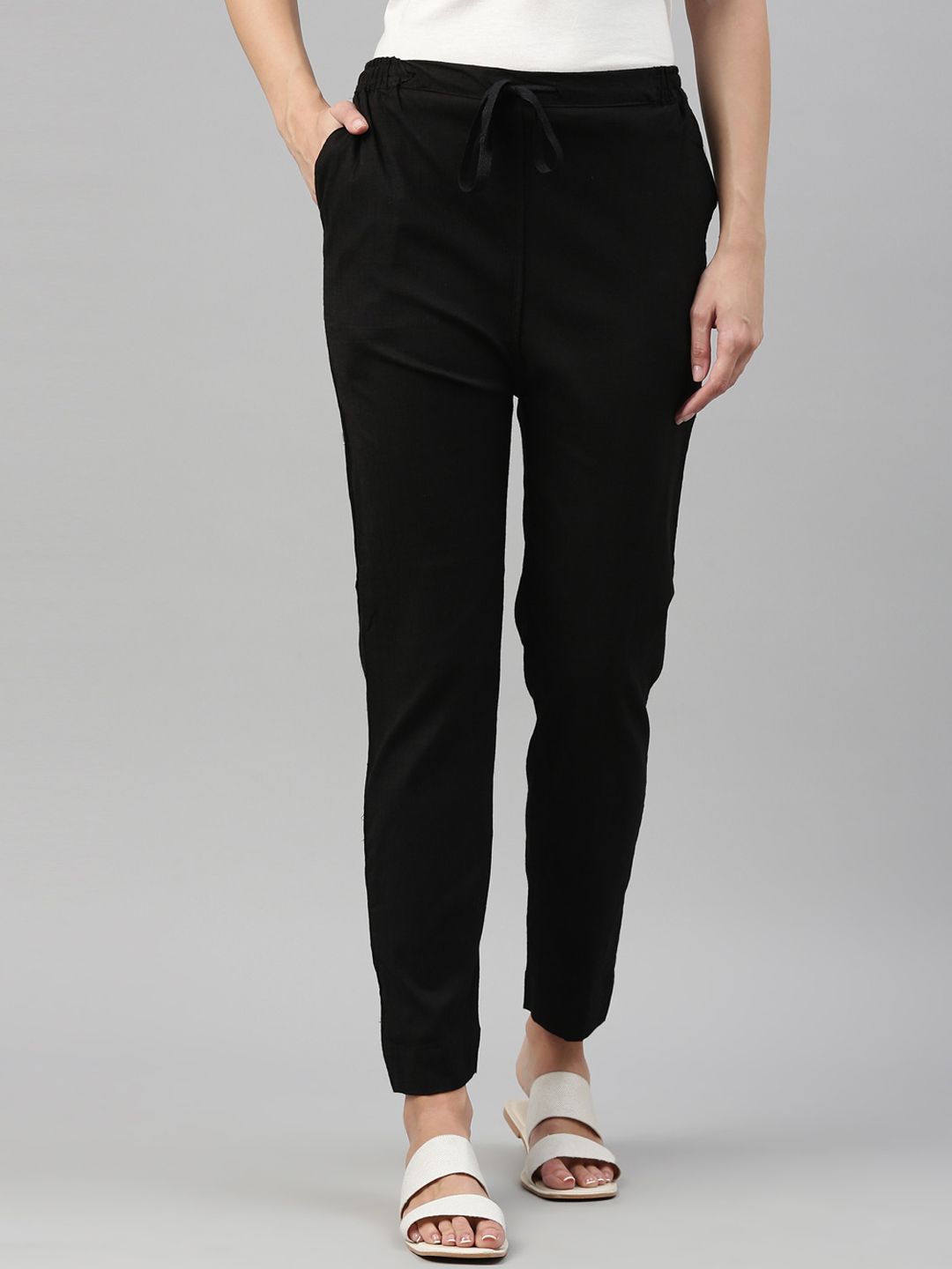 Kryptic Women Black Slim Fit Easy Wash Trousers Price in India