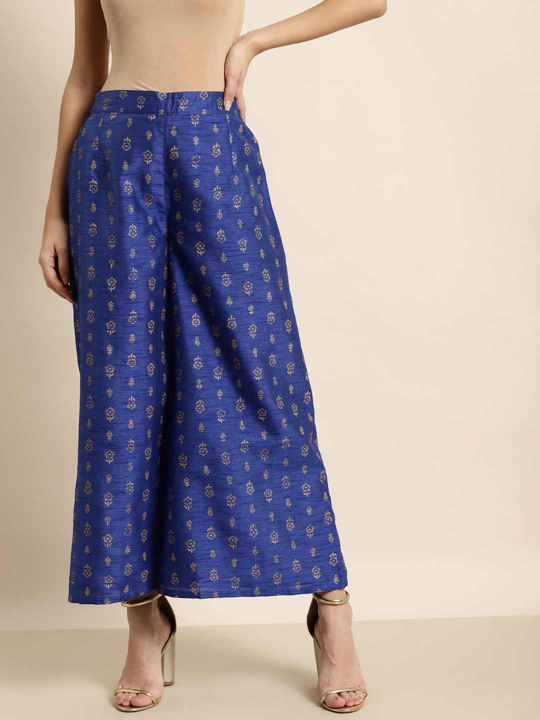 Shae by SASSAFRAS Women Blue & Gold-Toned Floral Printed Ankle Length Palazzos Price in India