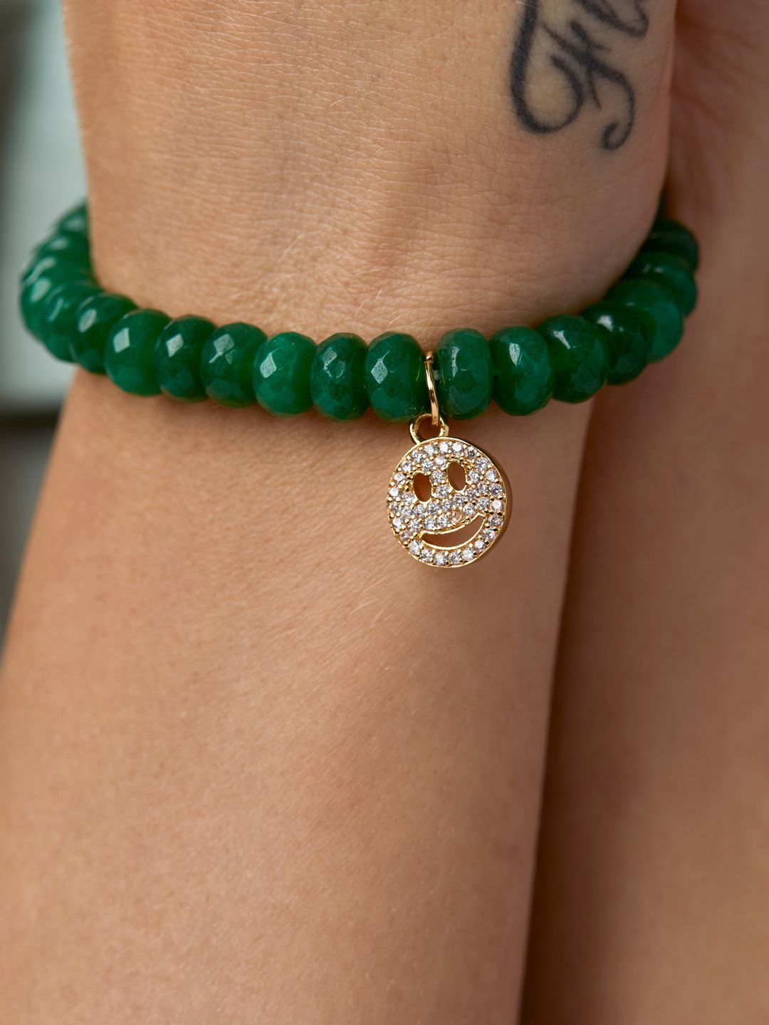 MINUTIAE Women Gold-Plated & Green Smiley Emoji Brass Onyx Elasticated Bracelet Price in India