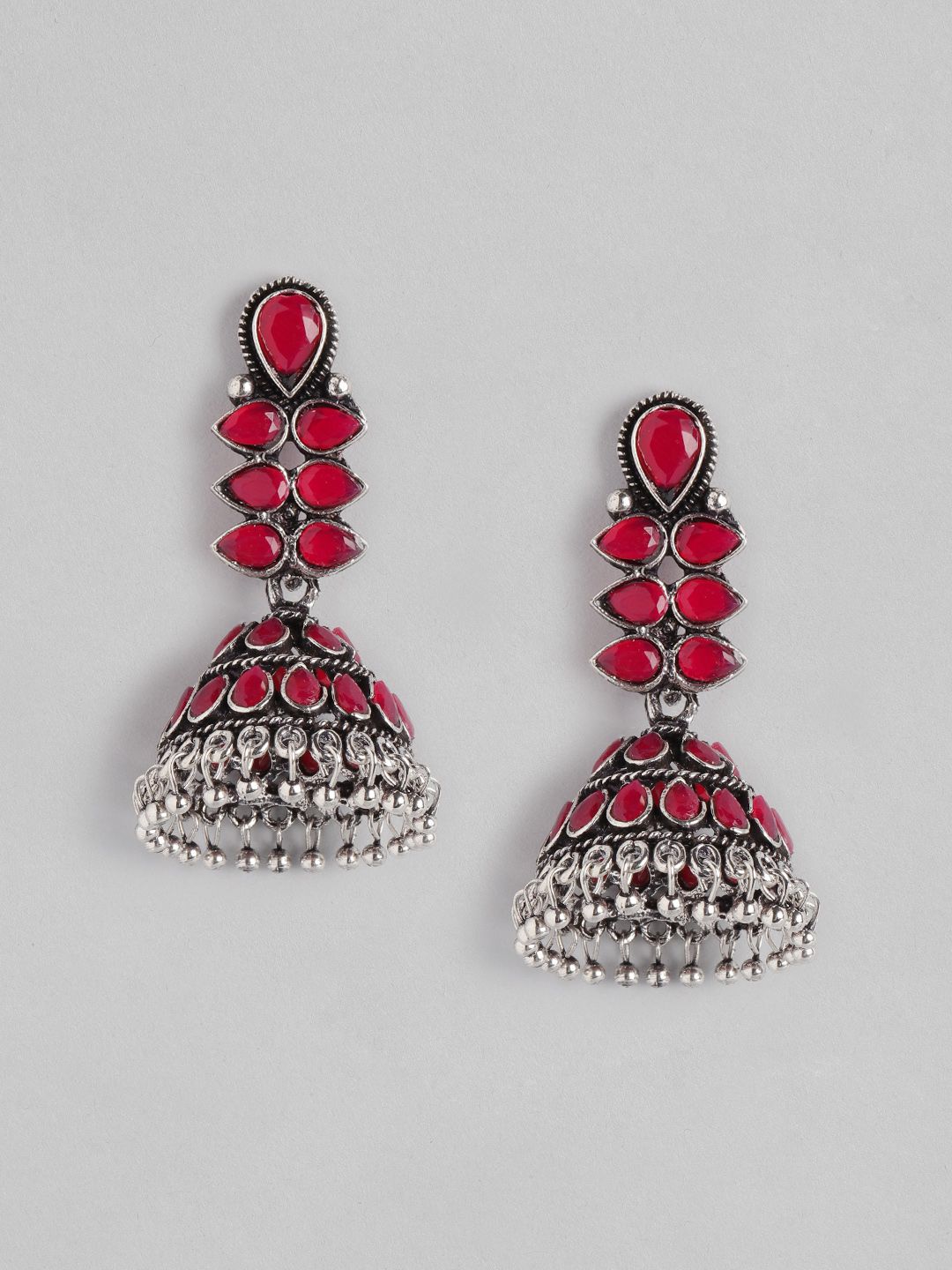 Anouk Oxidised Silver-Toned & Red Stone Studded Dome Shaped Jhumkas Earrings Price in India