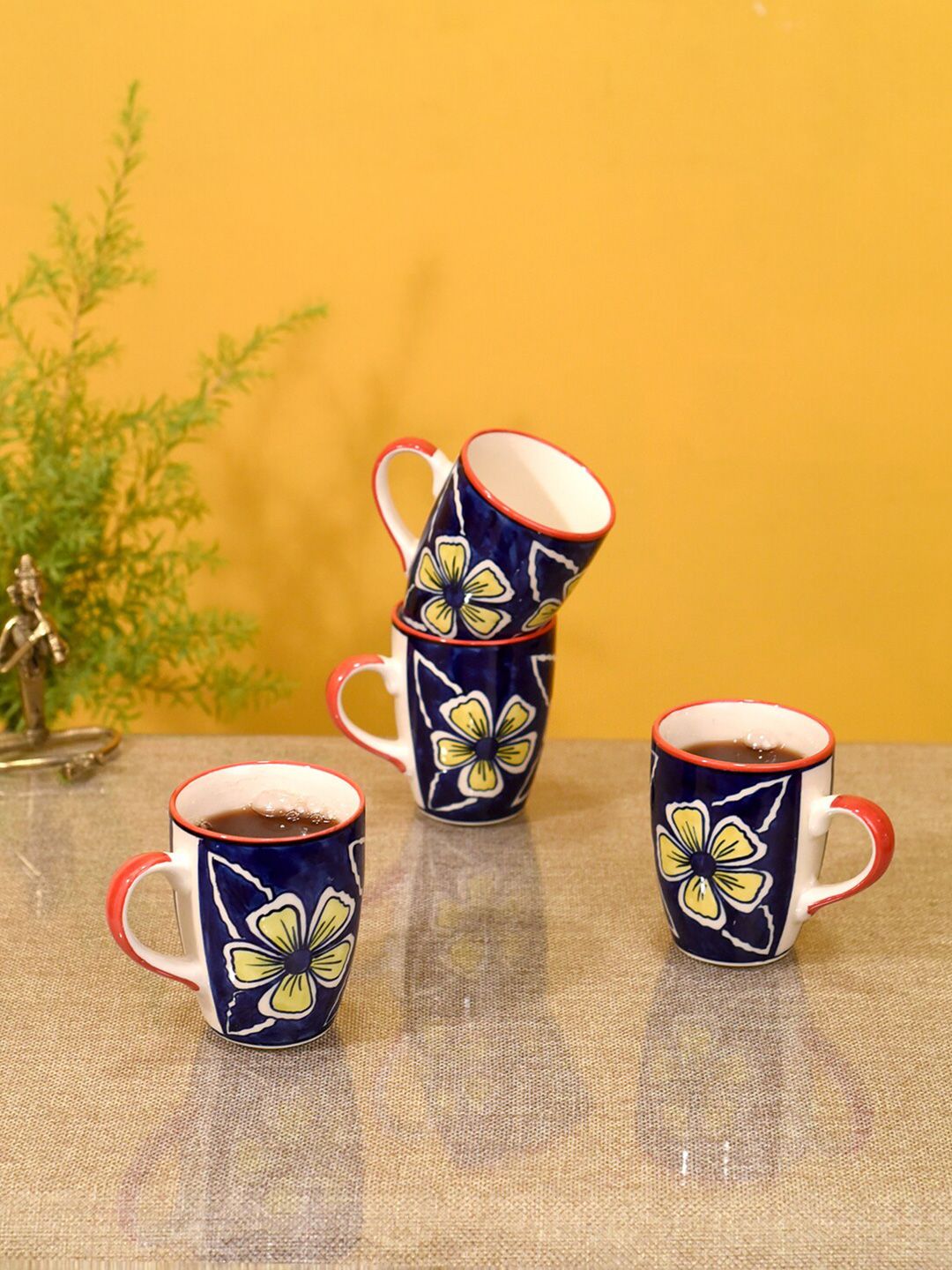 AAKRITI ART CREATIONS Set of 2 Blue & Yellow Floral Printed Ceramic Glossy Cups Price in India