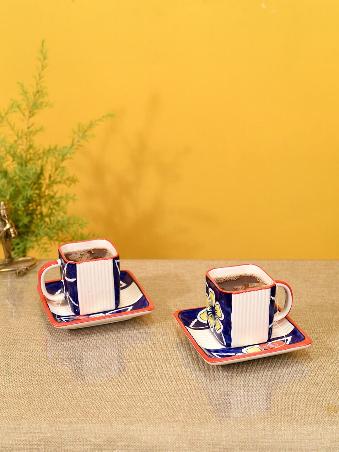 AAKRITI ART CREATIONS Blue & White 2 Pcs Printed Ceramic Glossy Cups and Saucers Set Price in India