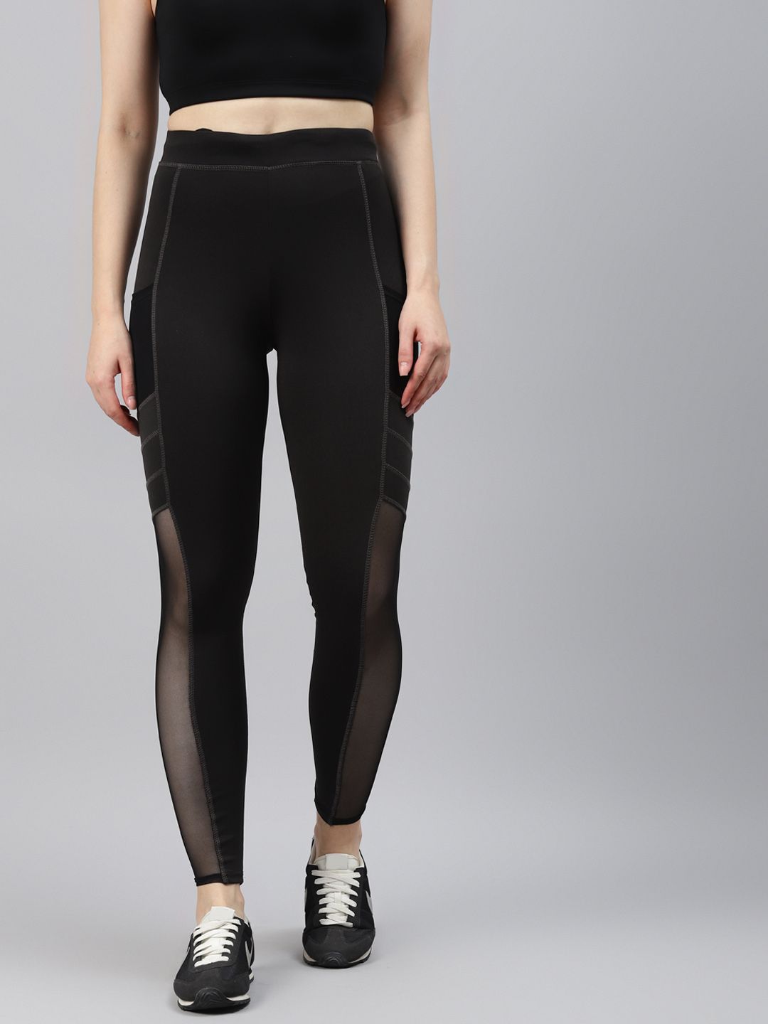 Blinkin Women Black Solid Mesh Paneled Gym Tights Price in India