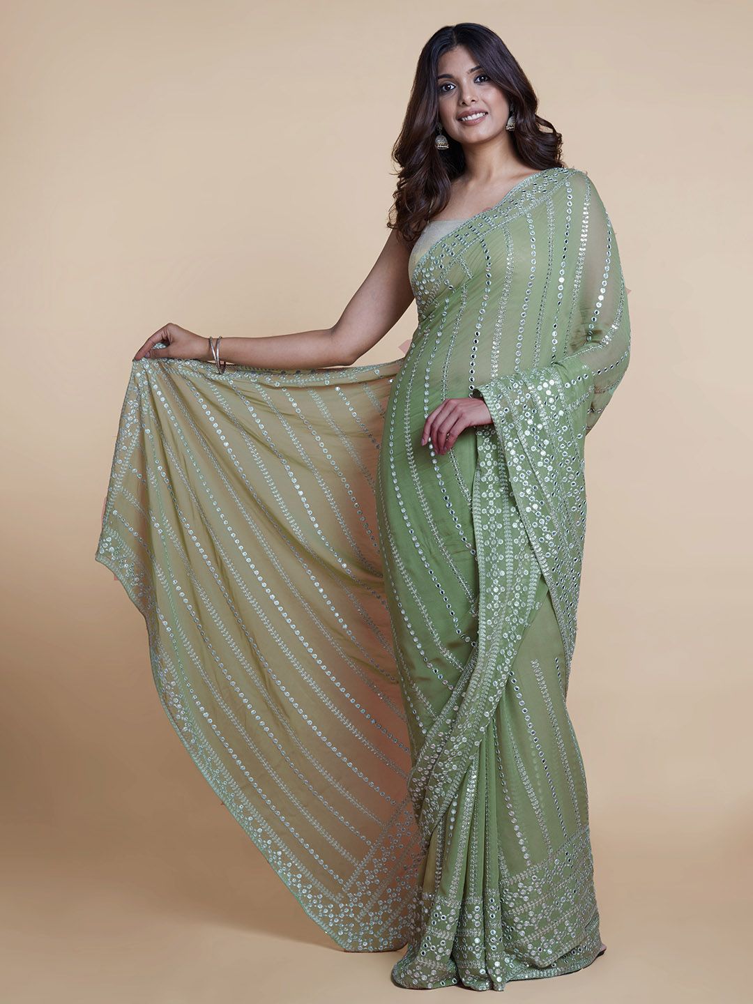 Suta Pista Green & White Embellished Saree