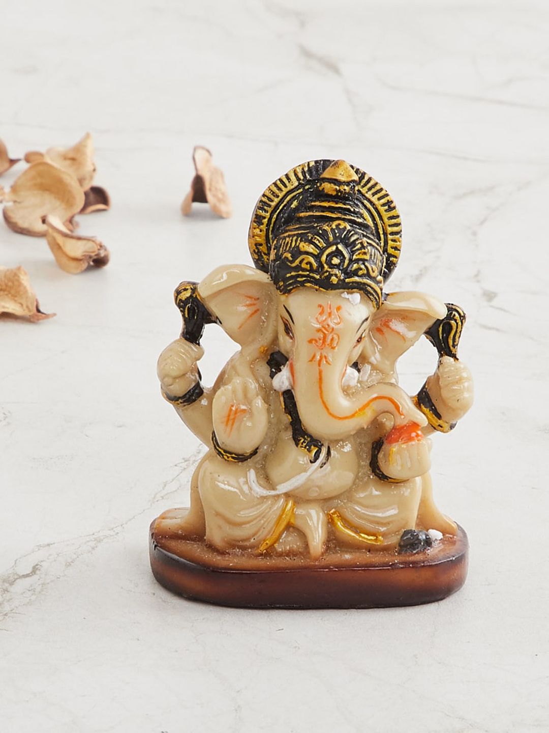 Home Centre Assorted Polyresin Showpiece Price in India