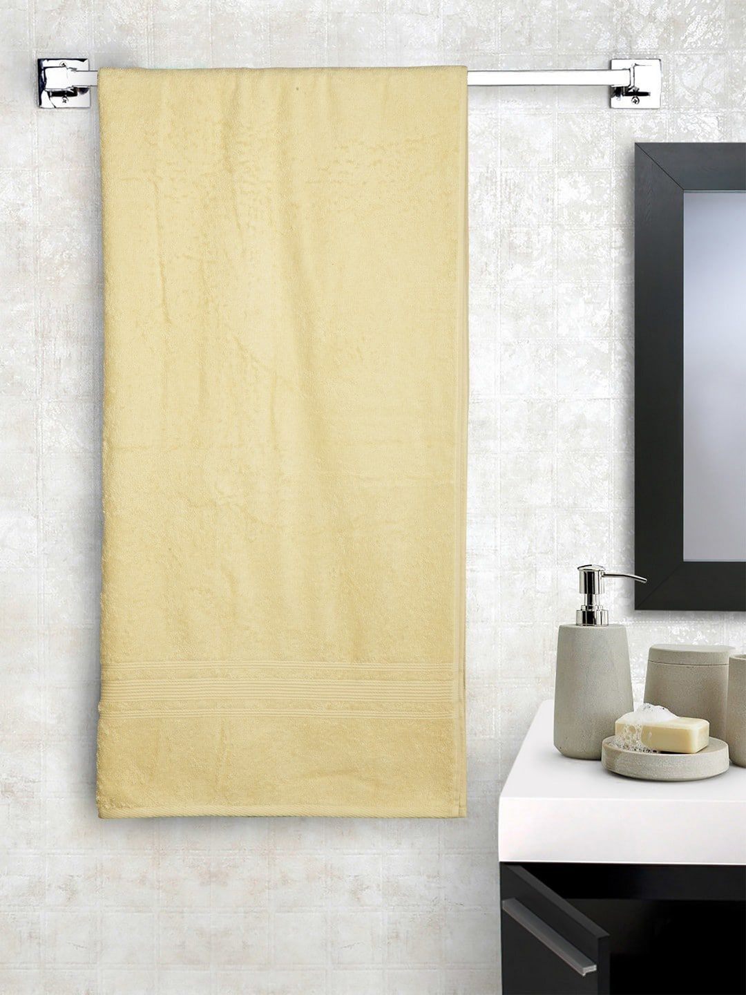Lushomes Cream Colored Solid 450 GSM Bath Towel Price in India