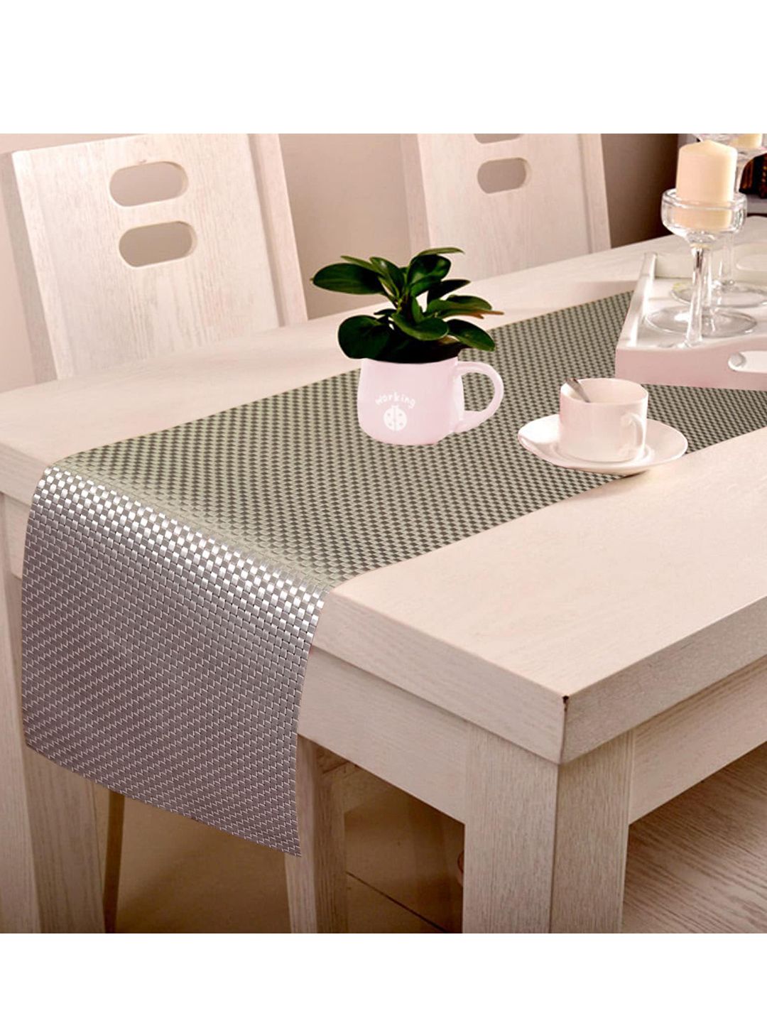 Lushomes Silver-Toned Self-Design Waterproof Table Runner Price in India