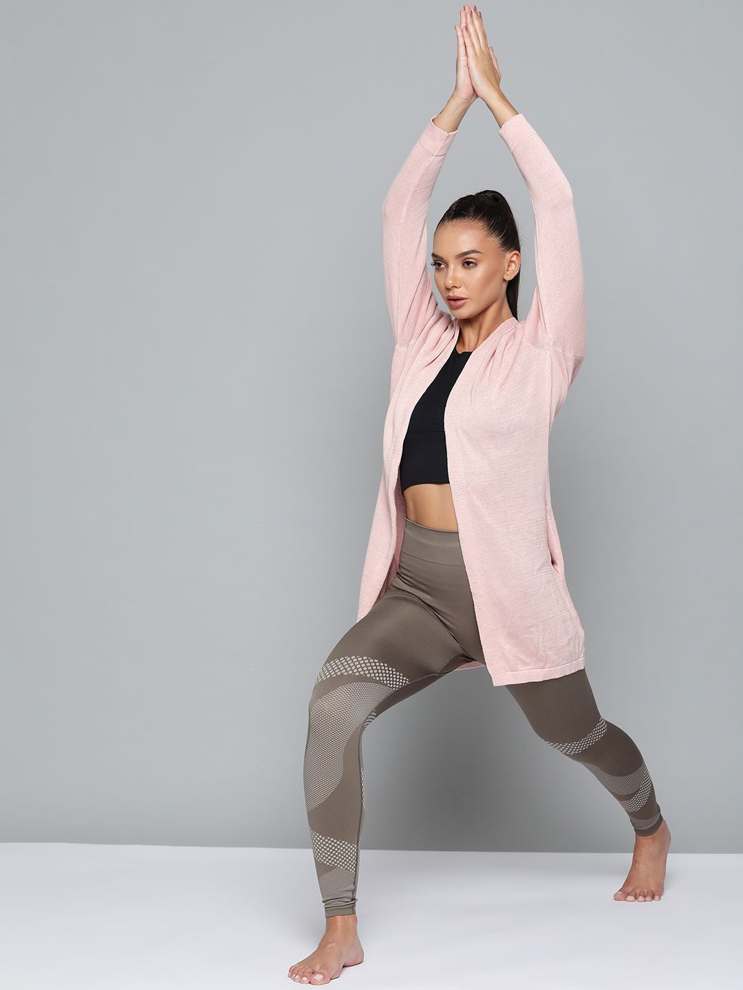 HRX By Hrithik Roshan Yoga Women Peach Whip Rapid-Dry Solid Sweaters Price in India