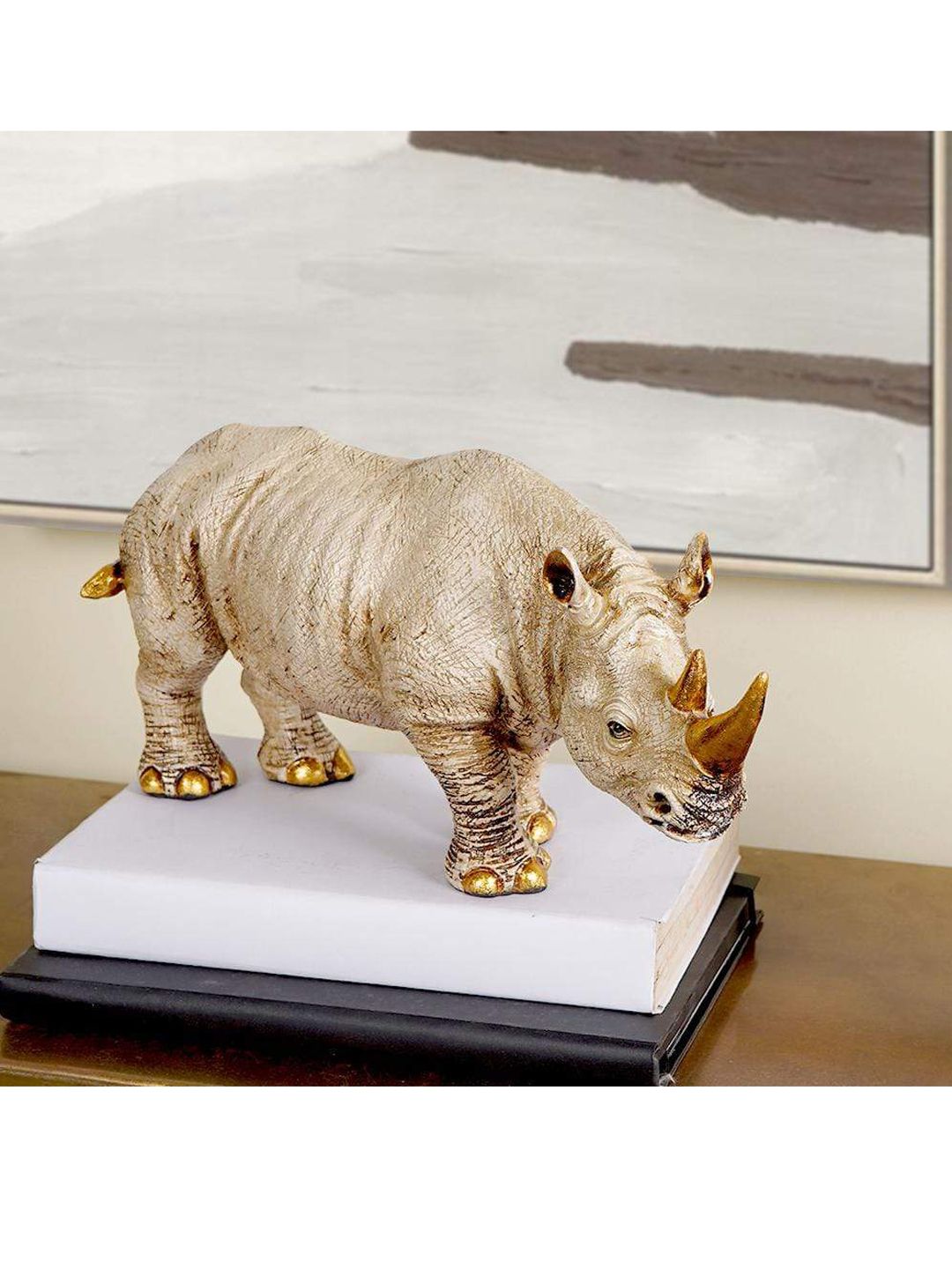 THE ARTMENT Gold-Toned Horned Rhino Showpiece Price in India