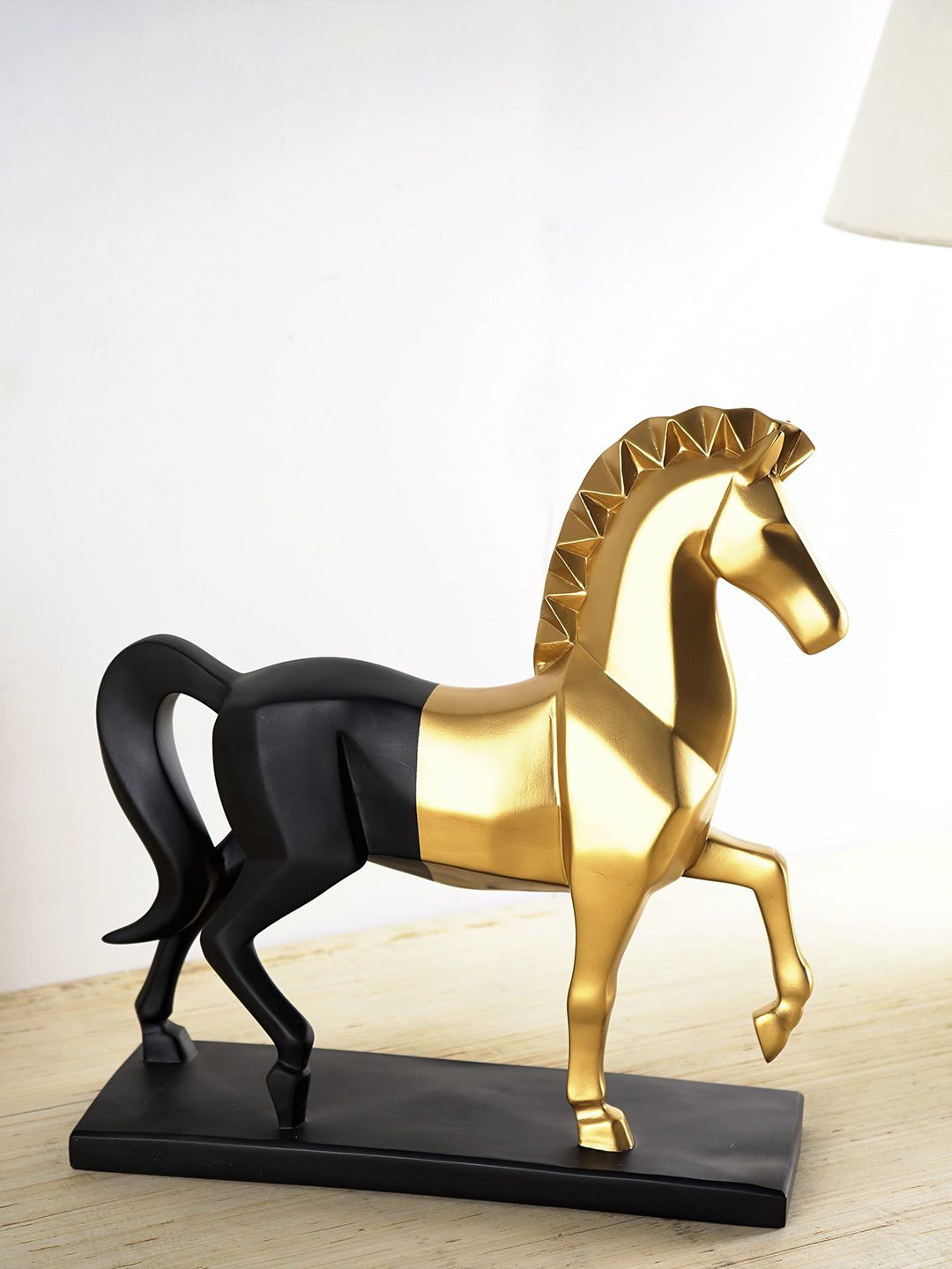 THE ARTMENT Black & Gold-Toned Bold and Majestic Horse Showpiece Price in India