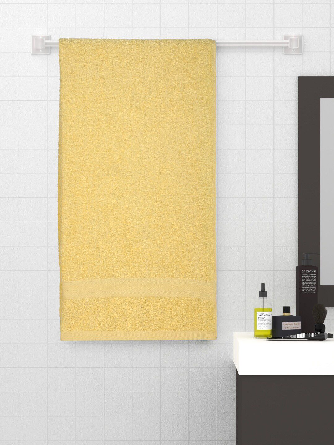 Raymond Home Yellow Solid Cotton 450 GSM Bath Towel Price in India