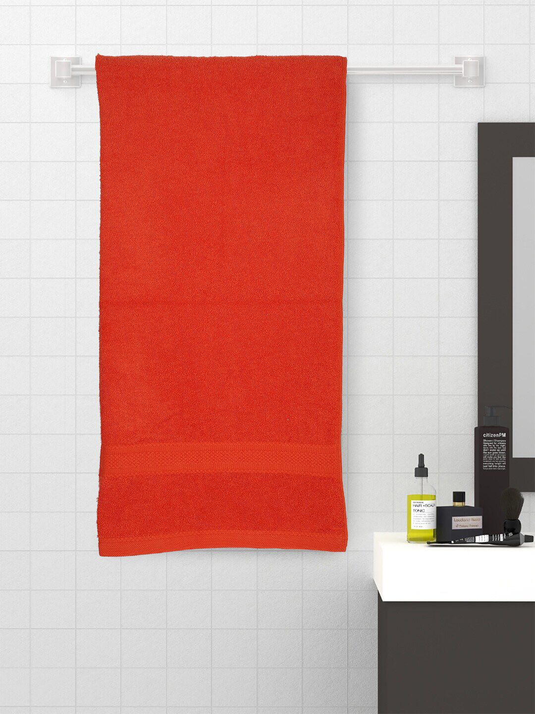 Raymond Home Orange Solid Cotton 450 GSM Bath Towel Price in India