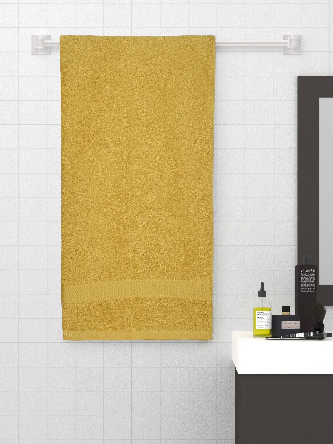 Raymond Home Yellow Solid 380 GSM Cotton Bath Towel Price in India