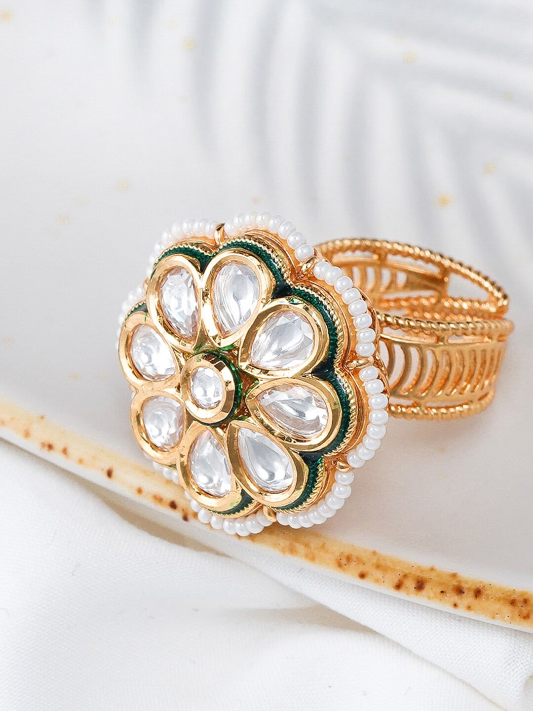 Queen Be Gold Toned & White Stone Studded Adjustable Finger Ring Price in India