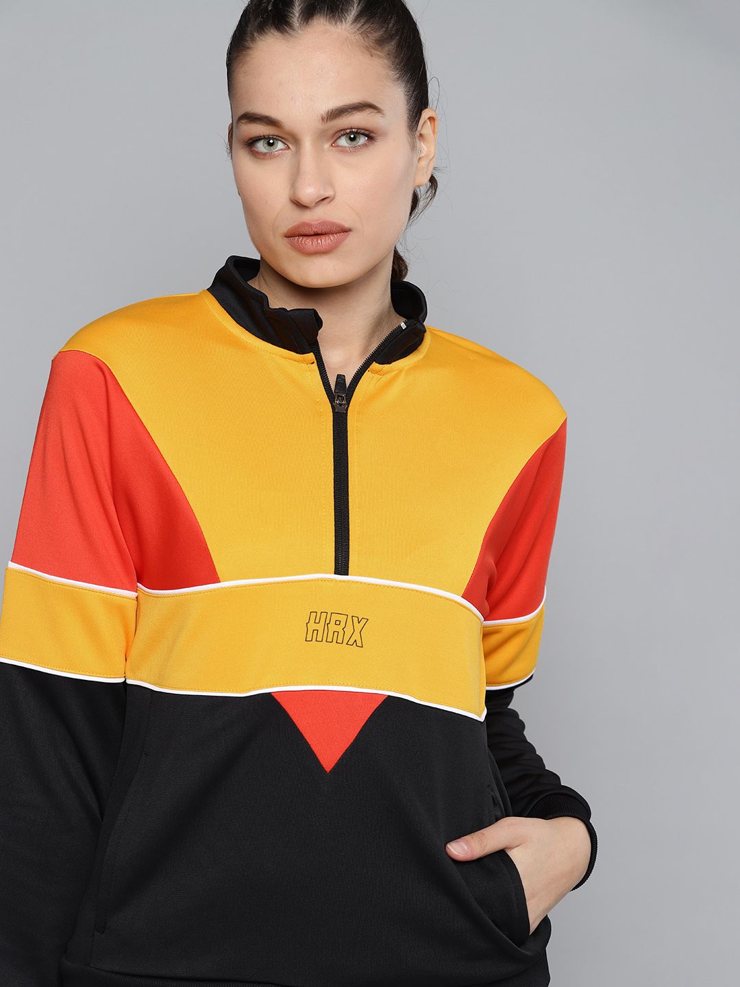 HRX by Hrithik Roshan Women Black & Yellow Colourblocked Sweatshirt Price in India
