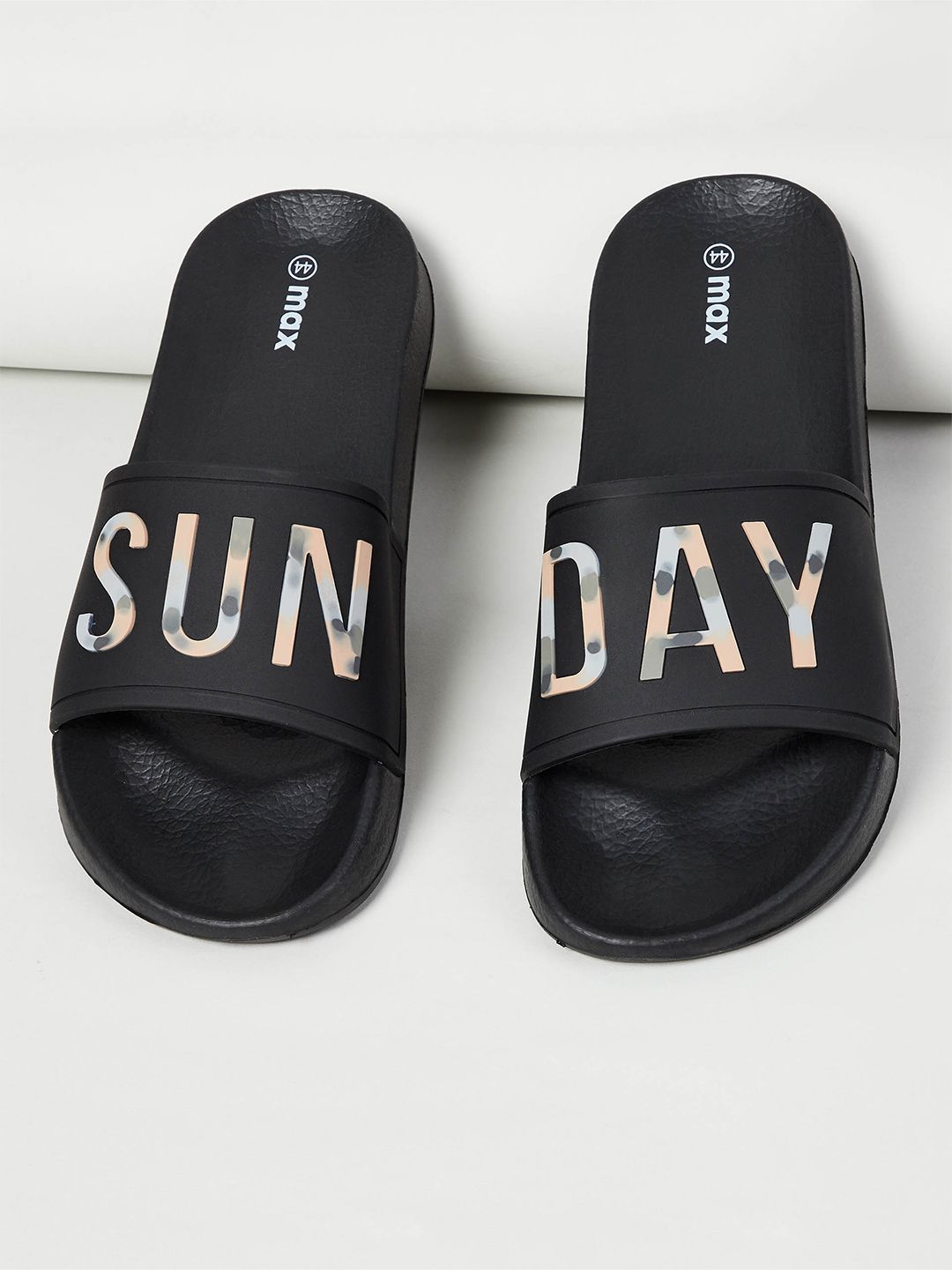 max Women Black Printed Rubber Sliders Price in India