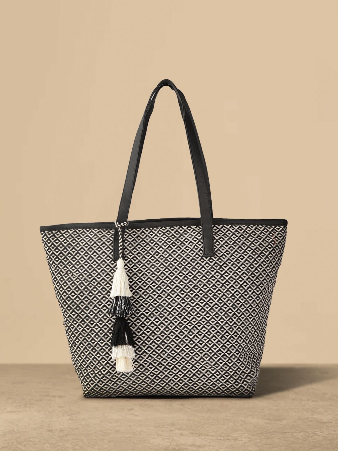 Anouk Black & Off-White Jacquard Woven Design Shoulder Bag with Tassel Price in India