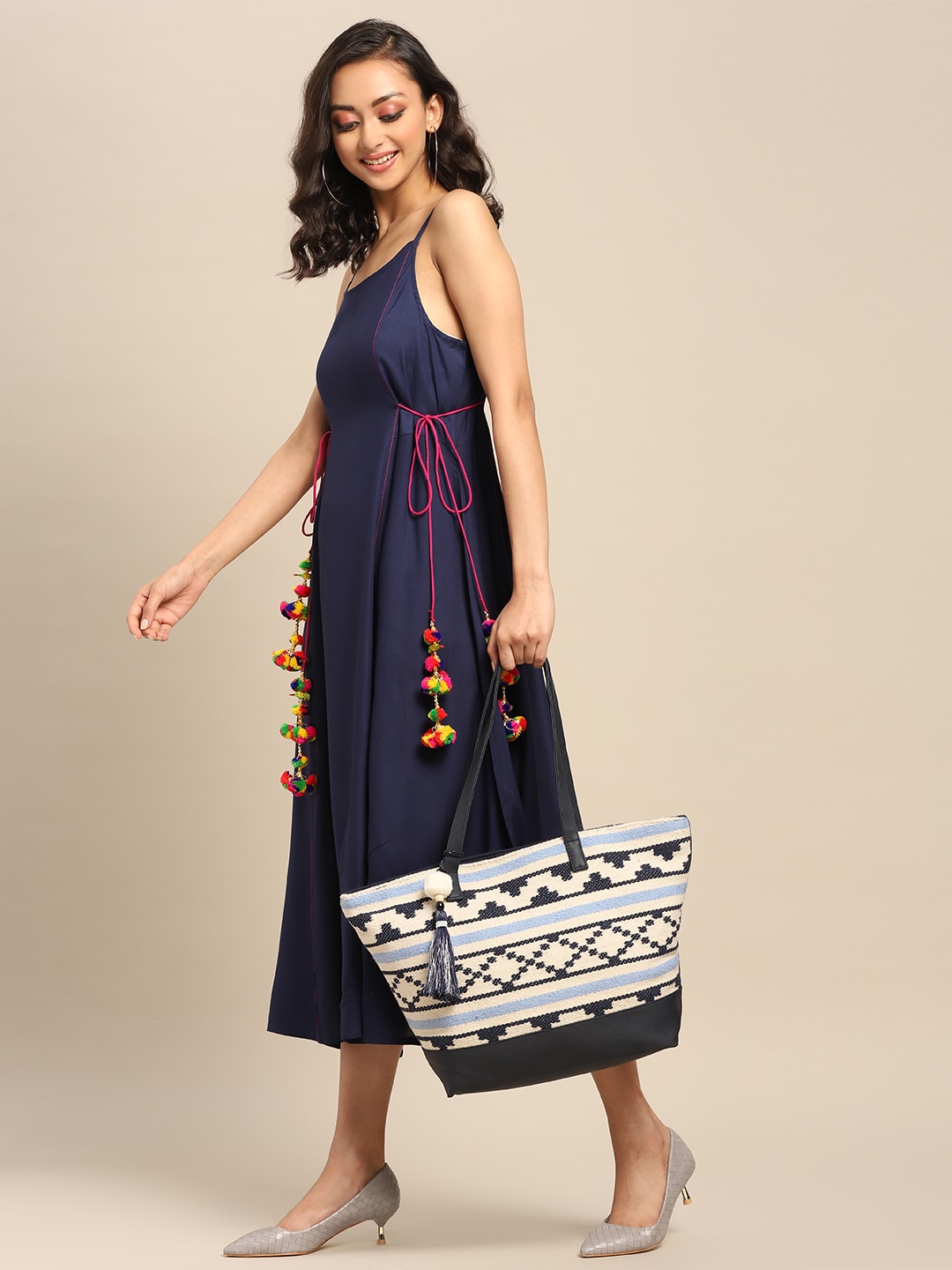 Anouk Navy Blue & Off-White Jacquard Woven Design Shoulder Bag with Tasselled Price in India