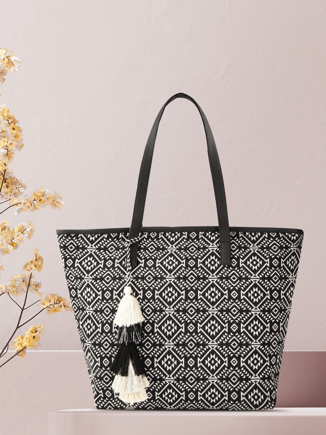 Anouk Black & Off-White Jacquard Woven Design Shoulder Bag with Tasselled Price in India