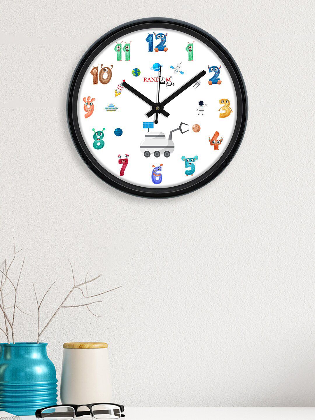 RANDOM Black & White Creative Kid Printed Analogue Wall Clock Price in India