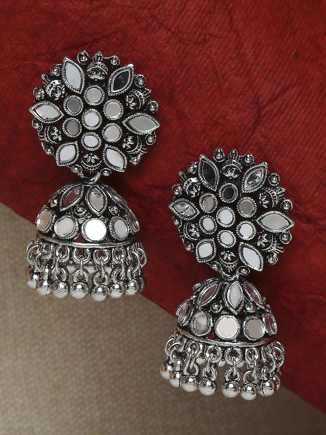 OOMPH Silver-Toned Dome Shaped Jhumkas Earrings Price in India