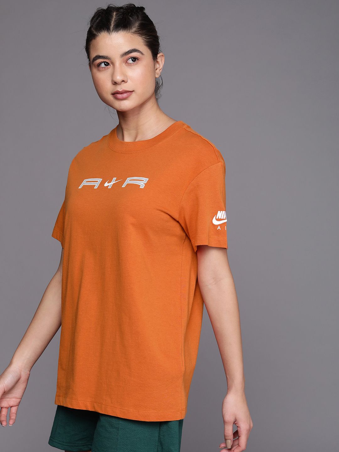 orange nike top womens