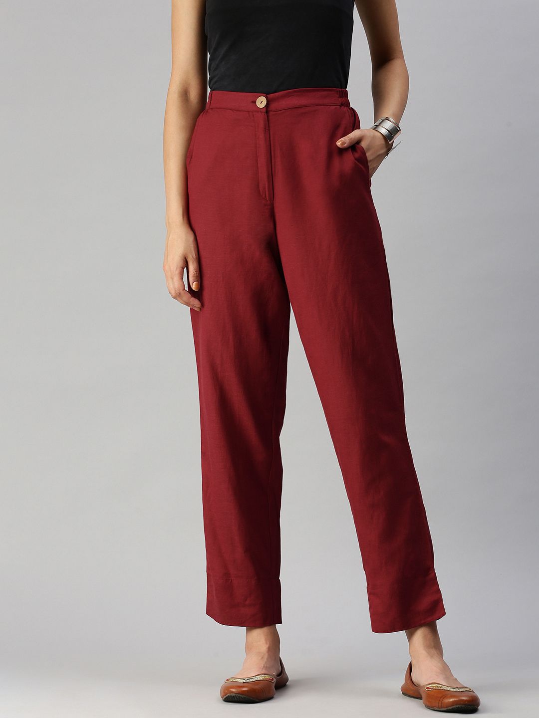 Global Desi Women Maroon Solid Straight Fit Trousers Price in India