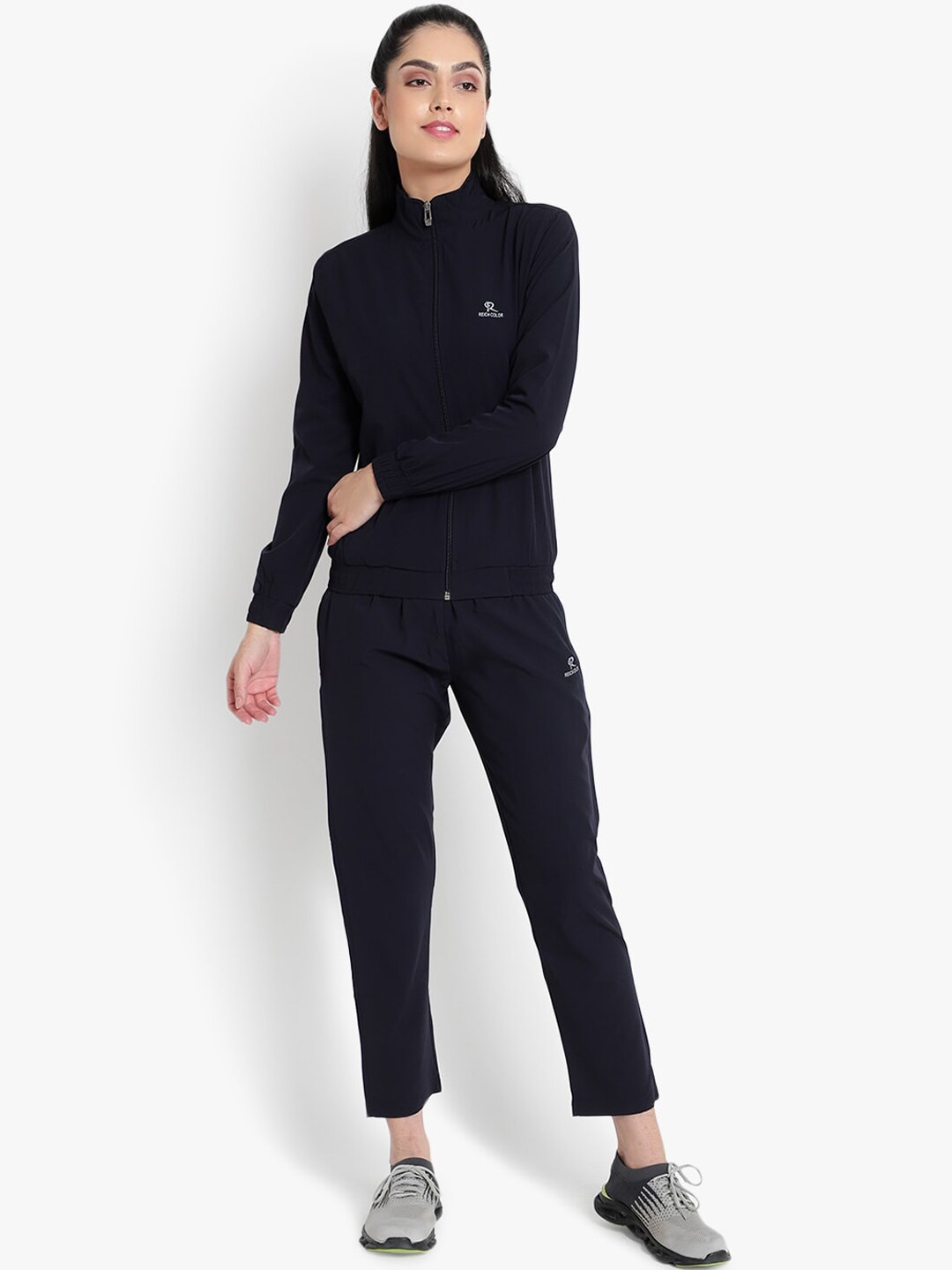Reich Color Women Navy Blue Solid Slim Fit Track Suit Price in India