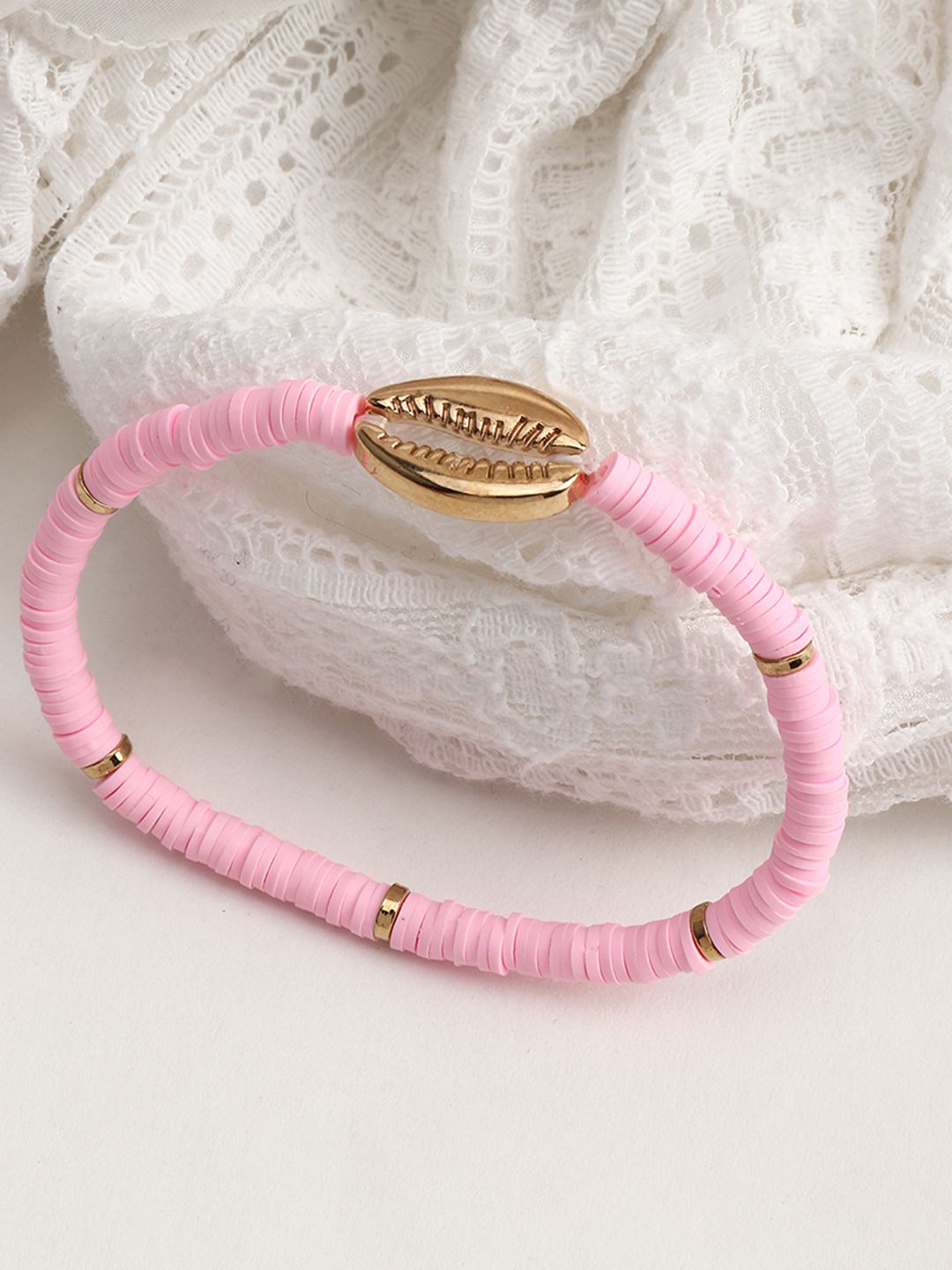 URBANIC Women Pink & Gold-Toned Cowry Detail Elasticated Bracelet Price in India