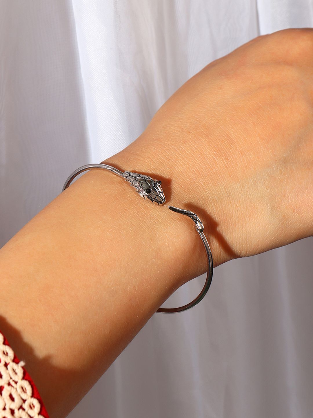 URBANIC Women Oxidised Silver-Toned Stone-Studded Textured Serpent Cuff Bracelet Price in India