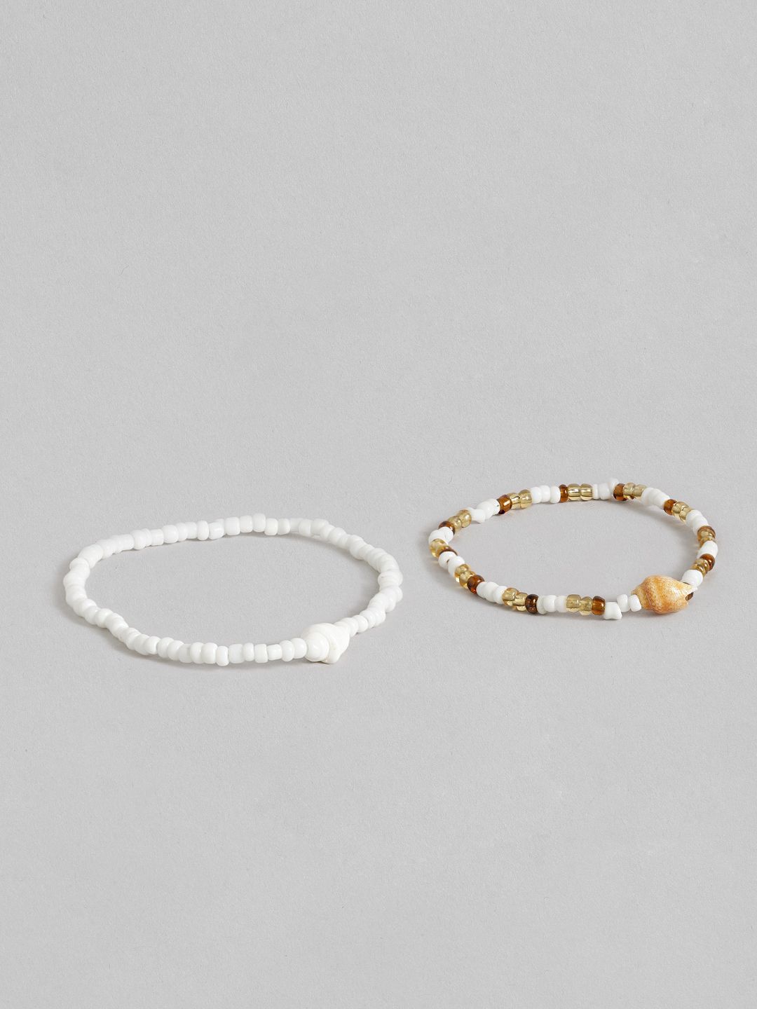 URBANIC Women Set of 2 Beaded Elasticated Bracelets with Shell Detail Price in India