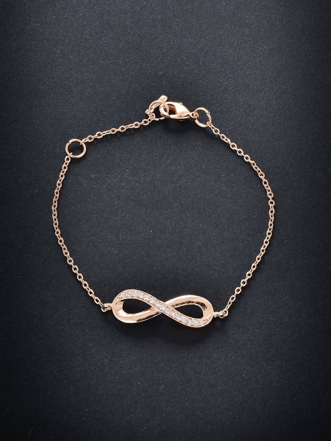 MINUTIAE Women Brass Crystals Handcrafted Rose Gold-Plated Infinity Link Bracelet Price in India