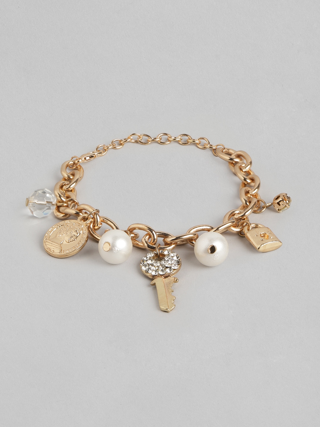DressBerry Women Gold-Toned & Off White Stone Studded & Beaded Link Charm Bracelet Price in India