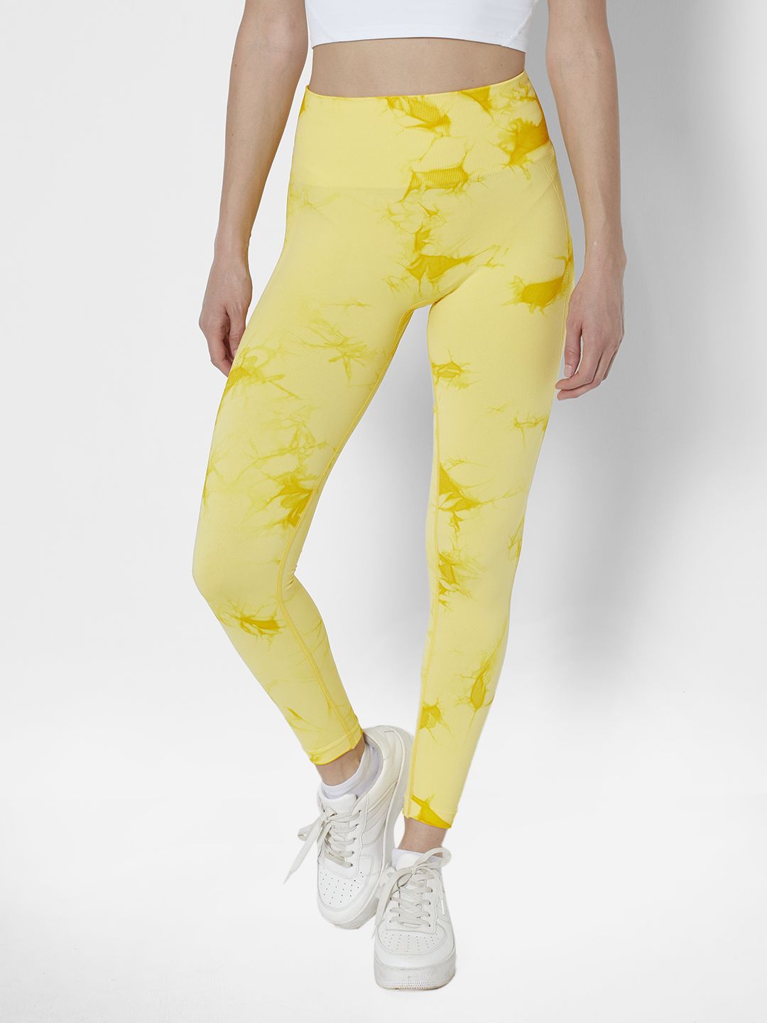 URBANIC Women Yellow Dyed Gym Tights Price in India