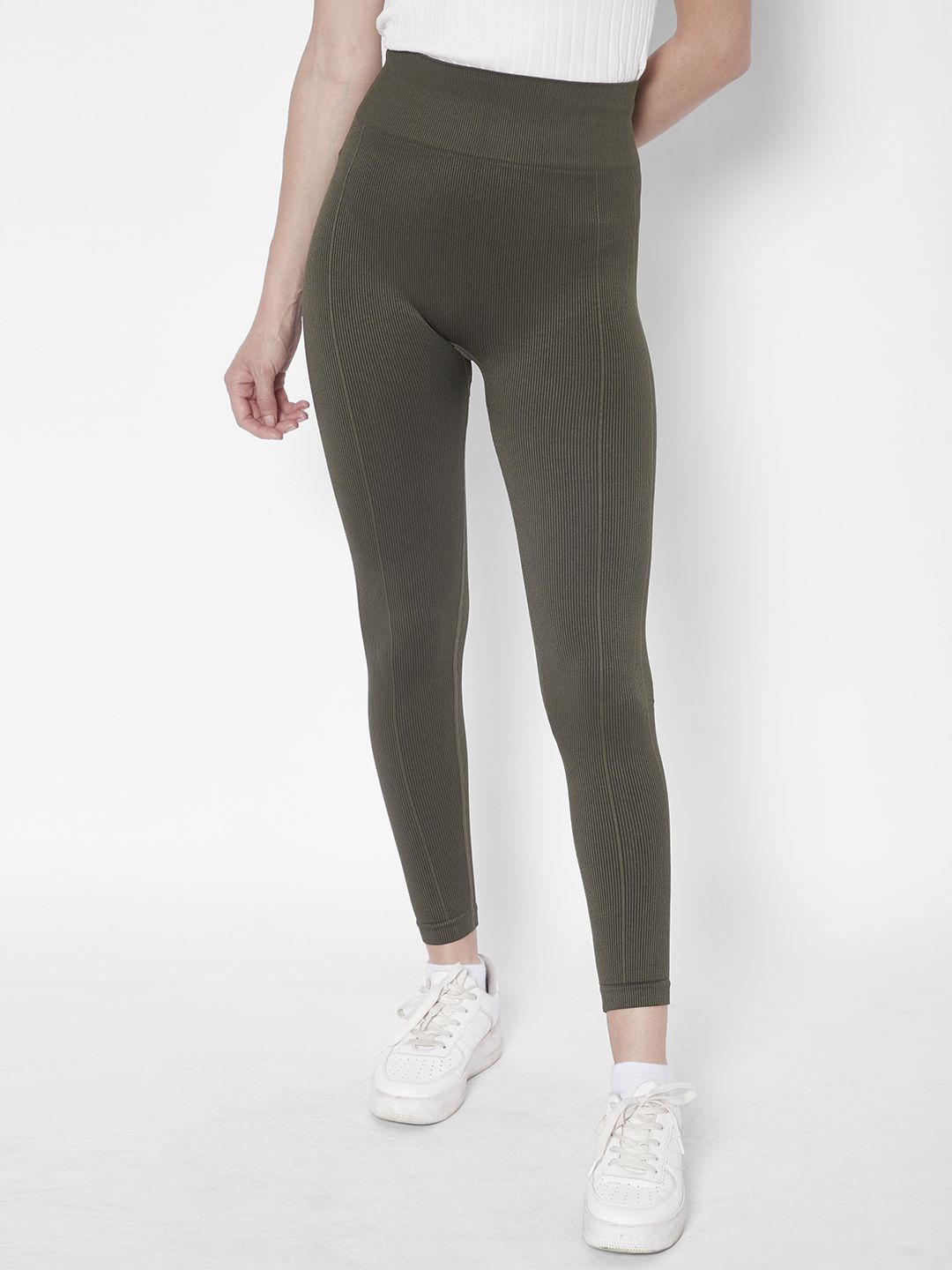 URBANIC Women Olive Green Solid Gym Tights Price in India