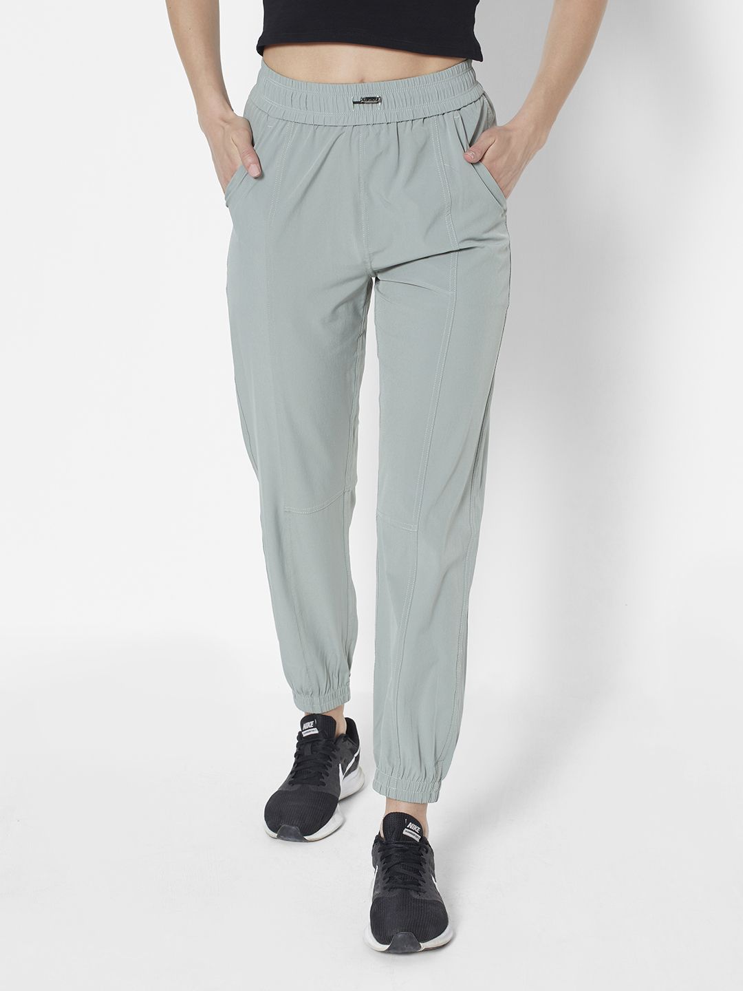 URBANIC Women Mint Green Solid Gym Joggers Price in India