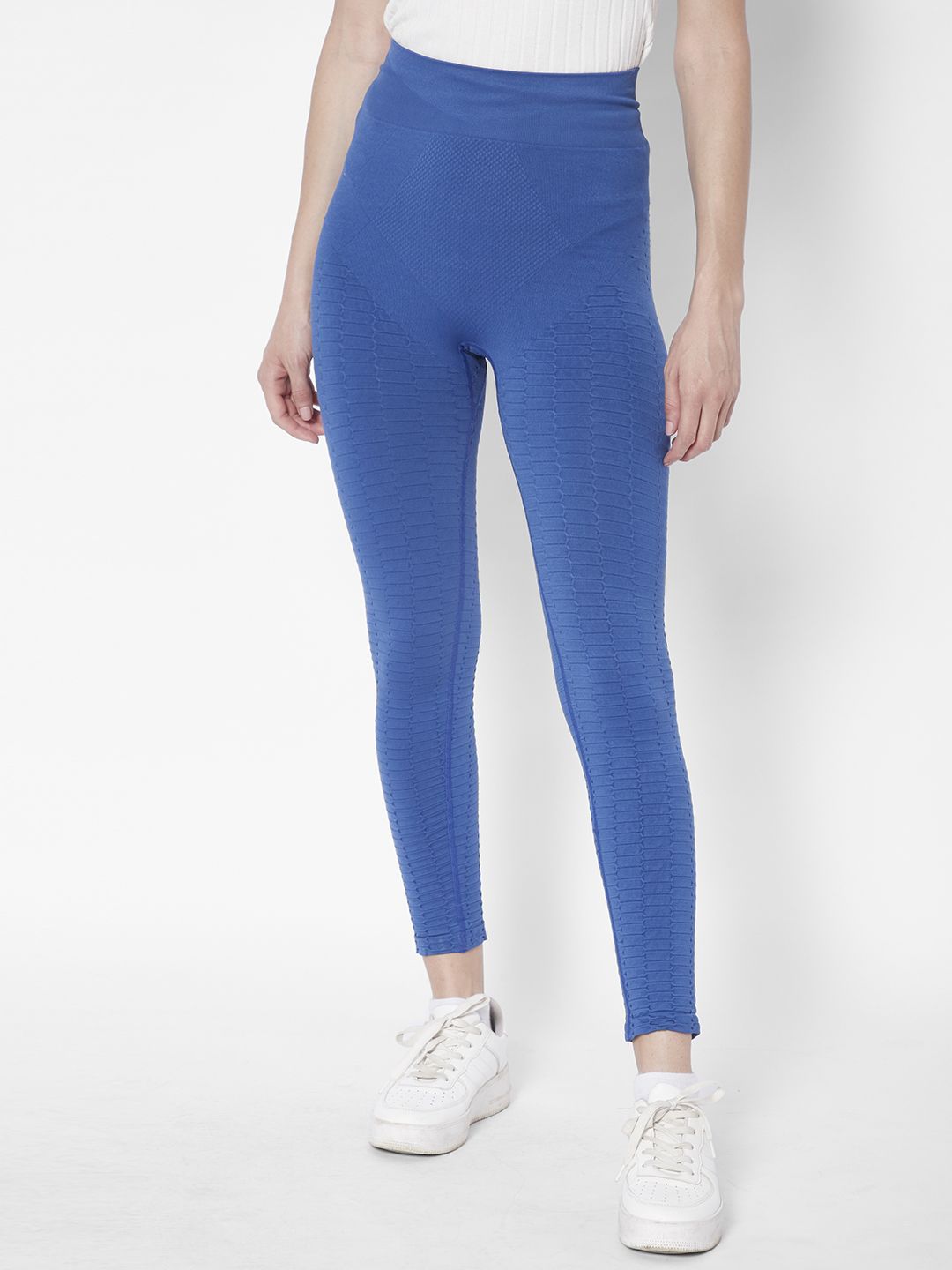 URBANIC Women Blue Solid Gym Tights Price in India