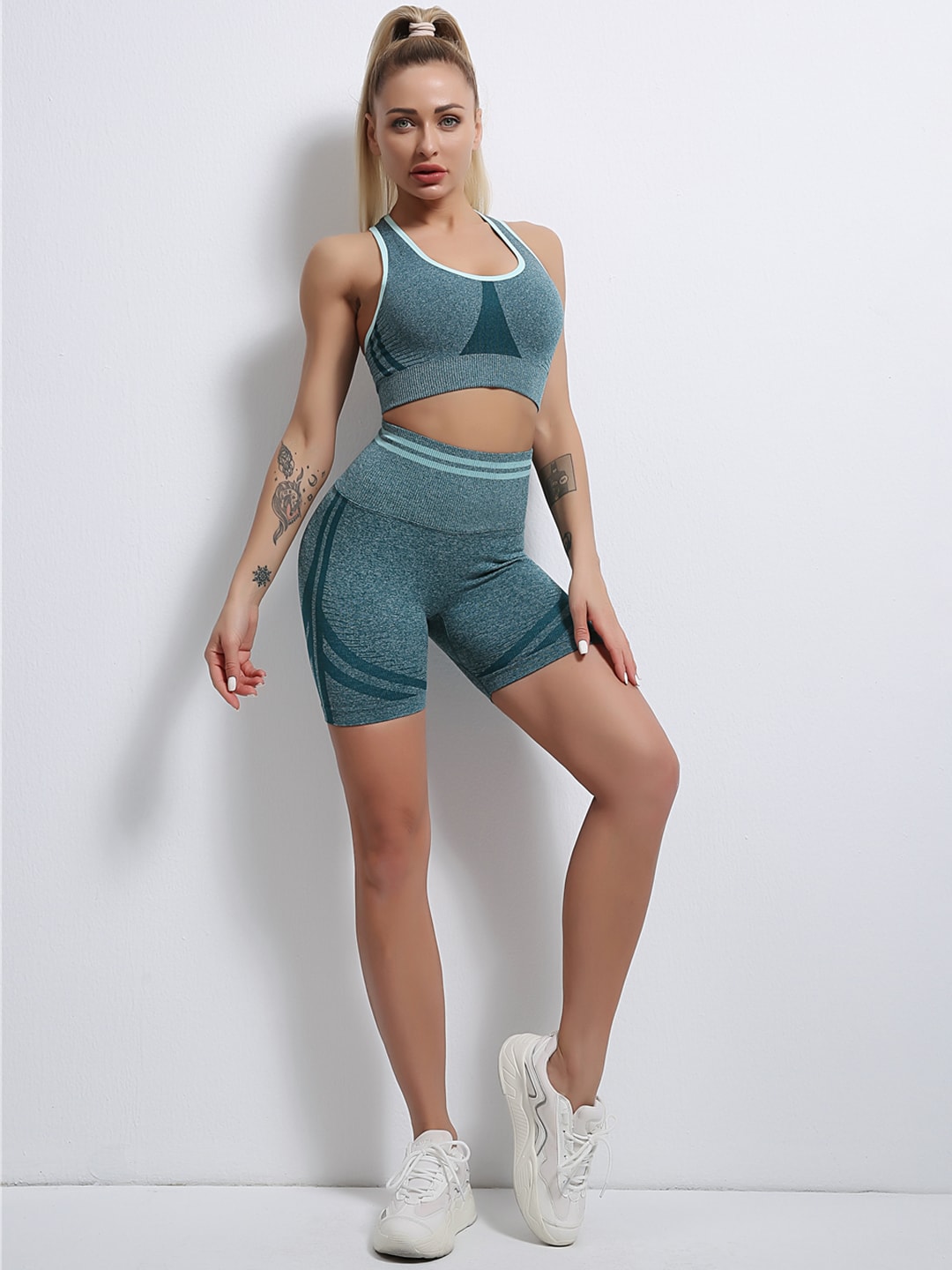 URBANIC Women Green Solid Halter Neck Styled Back Gym Tracksuit Price in India