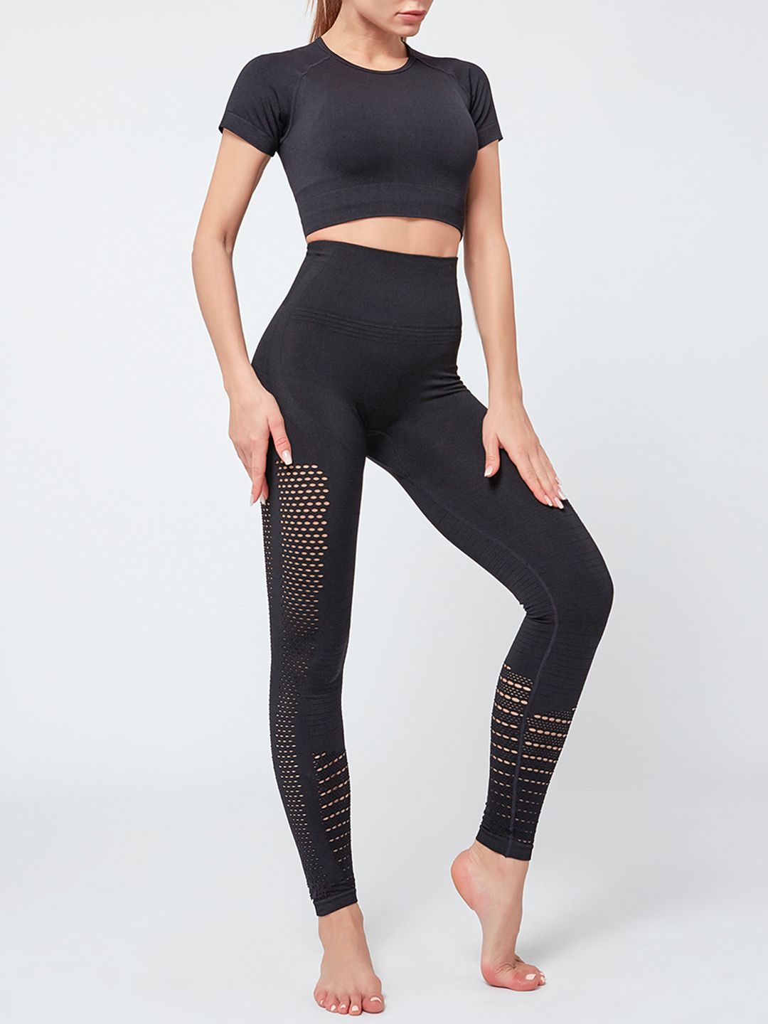 URBANIC Women Black Solid Gym Track Suit with Cut Out Detail Price in India