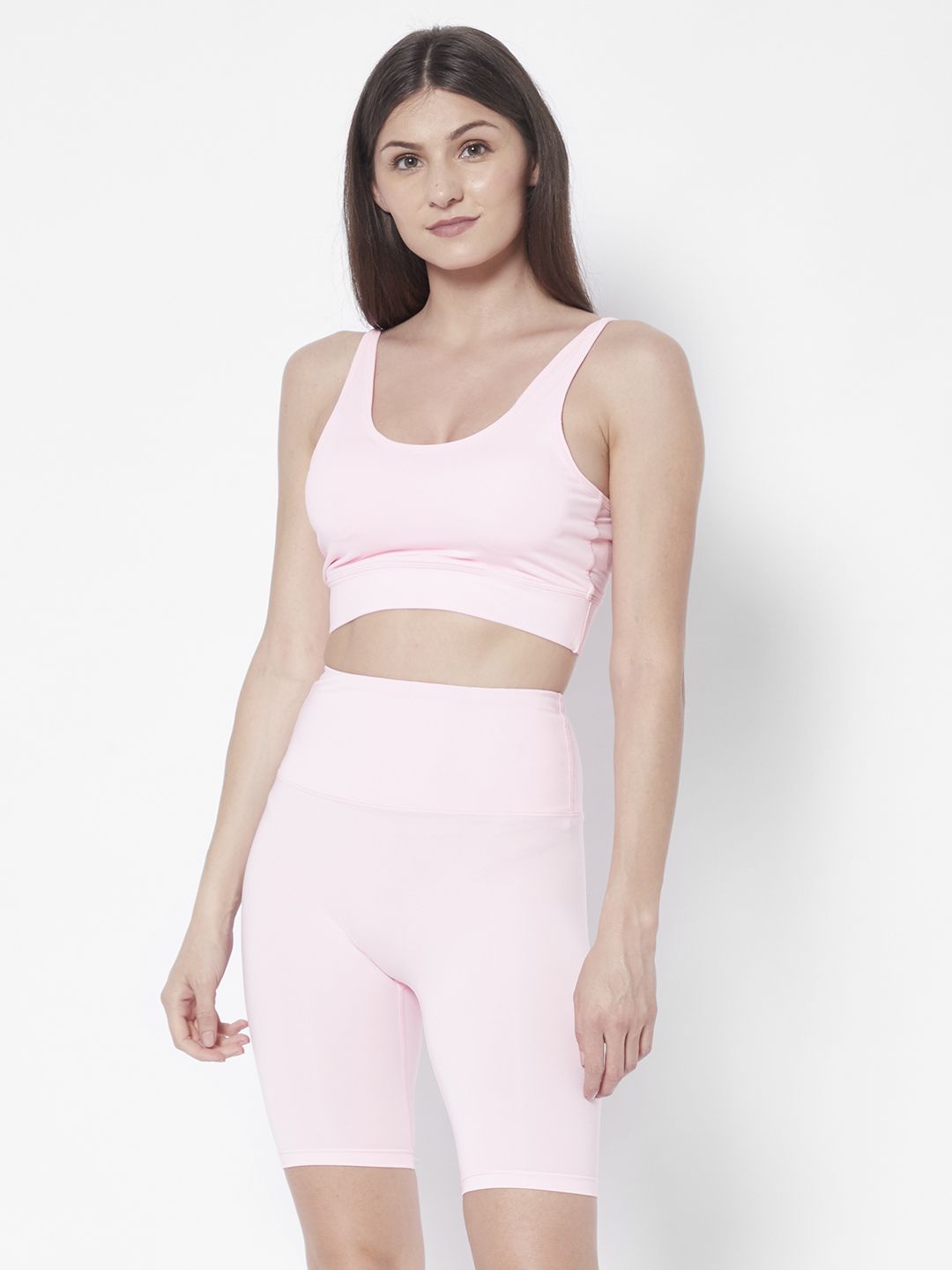 URBANIC Women Pink Solid Slim Fit Gym Tracksuit Price in India