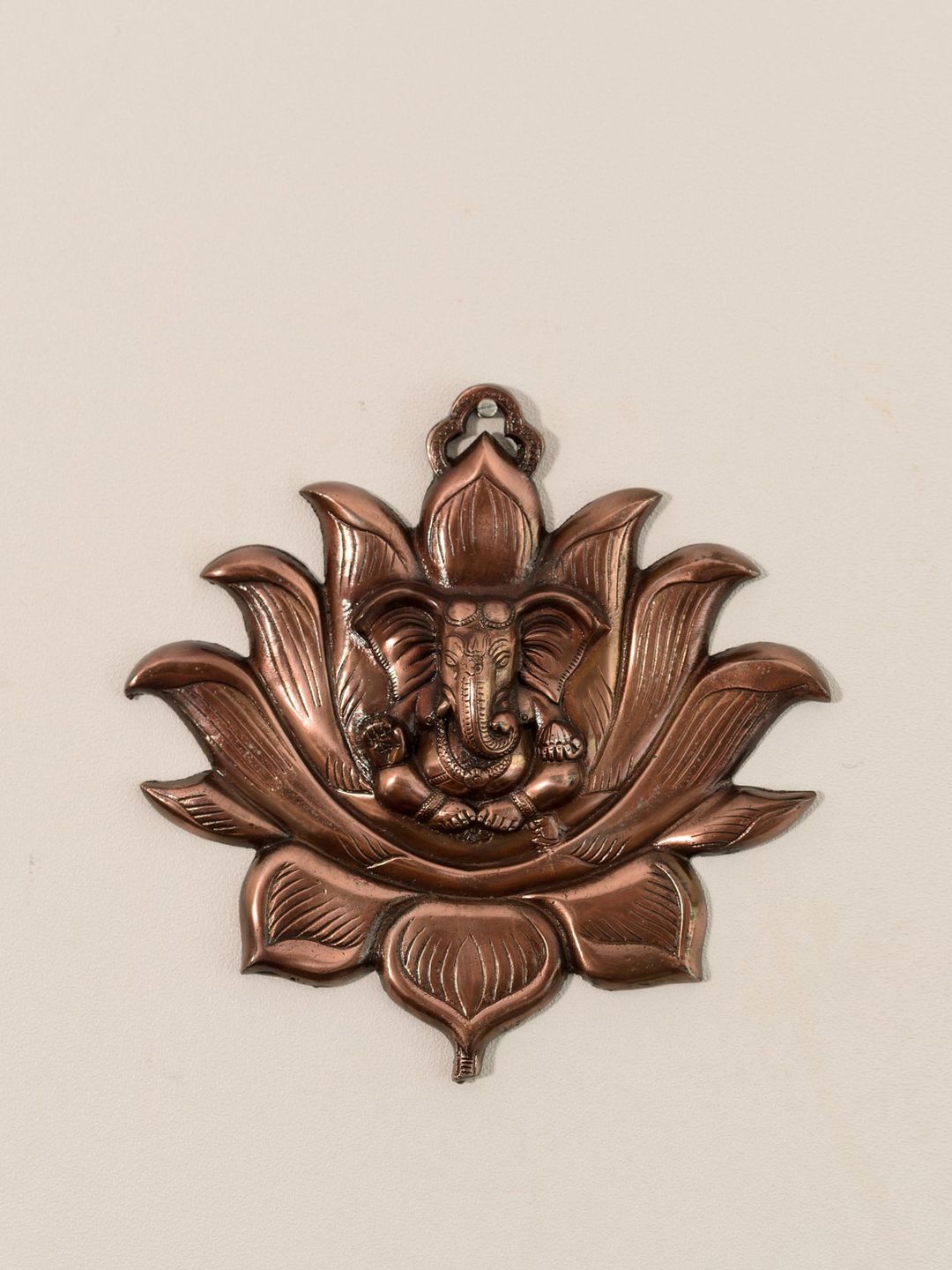 eCraftIndia Copper-Toned Metal Lord Ganesh Idol Wall Decor Price in India