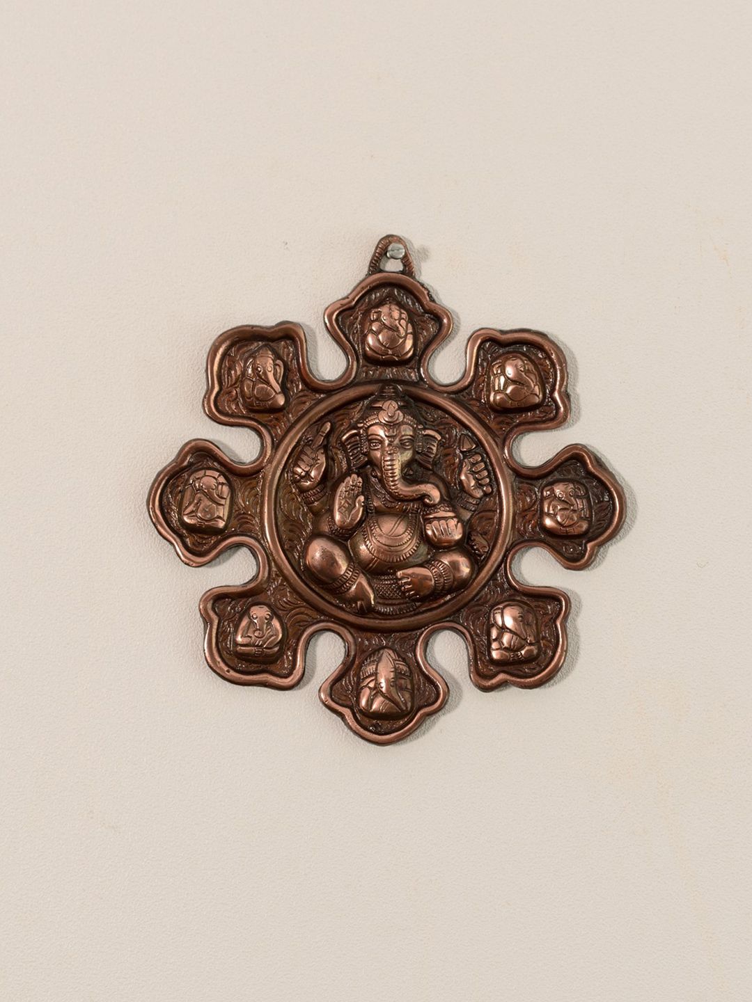 eCraftIndia Copper-Toned Metal Lord Ganesh Idol Wall Hanging Price in India