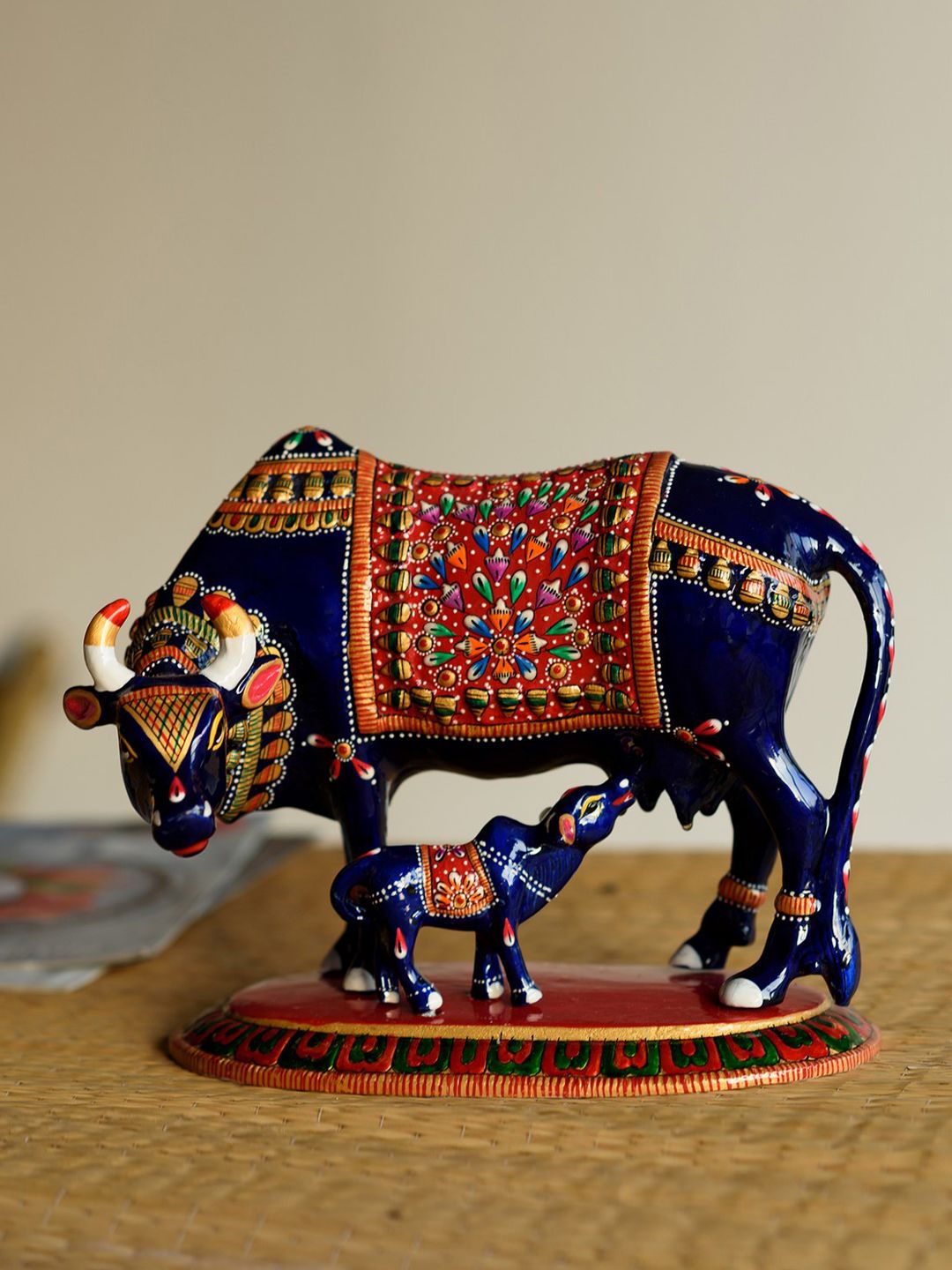eCraftIndia Blue Meenakari & Metal Cow-Shaped Showpiece with a Calf Price in India