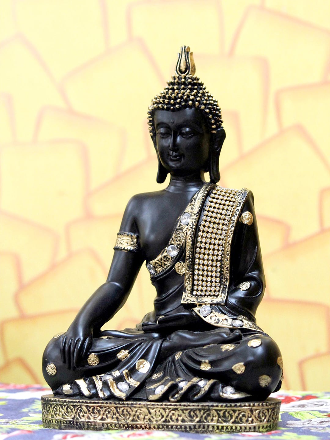 eCraftIndia Black & Gold-Toned Handcrafted Buddha Showpiece Price in India