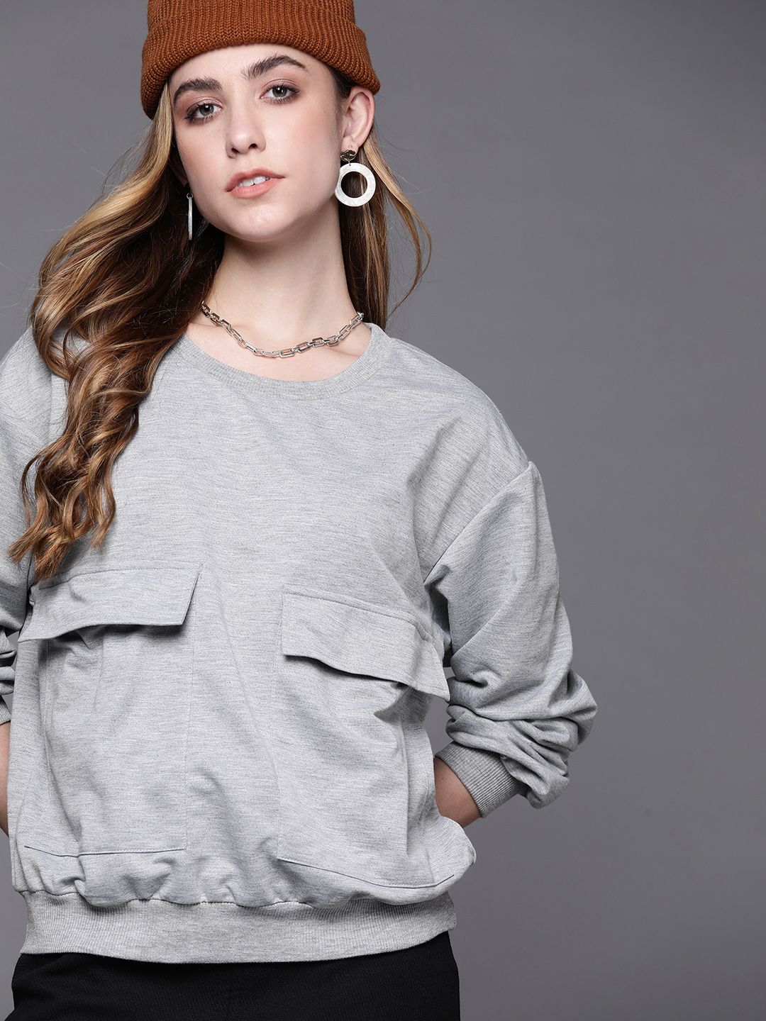 JC Mode Women Grey Melange Solid Sweatshirt Price in India