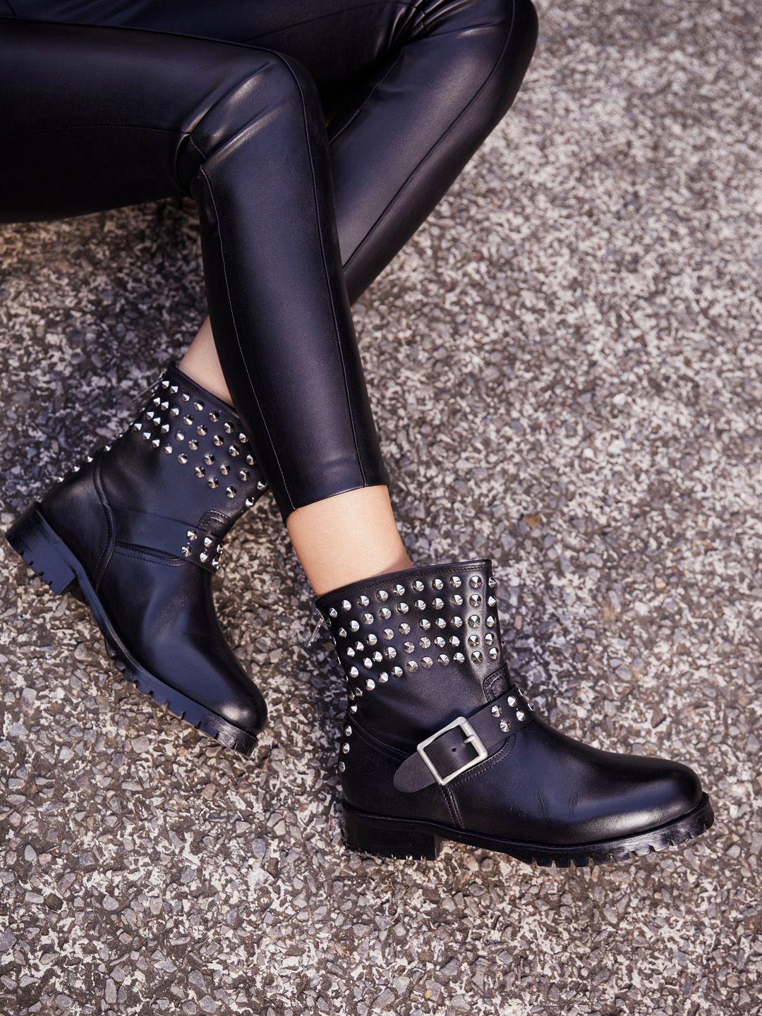 Saint G Women Black & Silver-Toned Metal Studded Black Leather Biker Boots Price in India