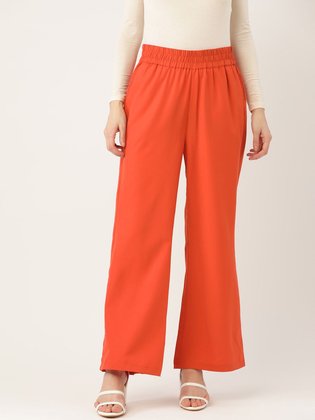 DressBerry Women Rust Orange Flared Trousers Price in India